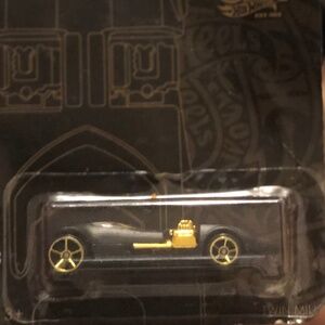Black and Gold Die-Cast Car
